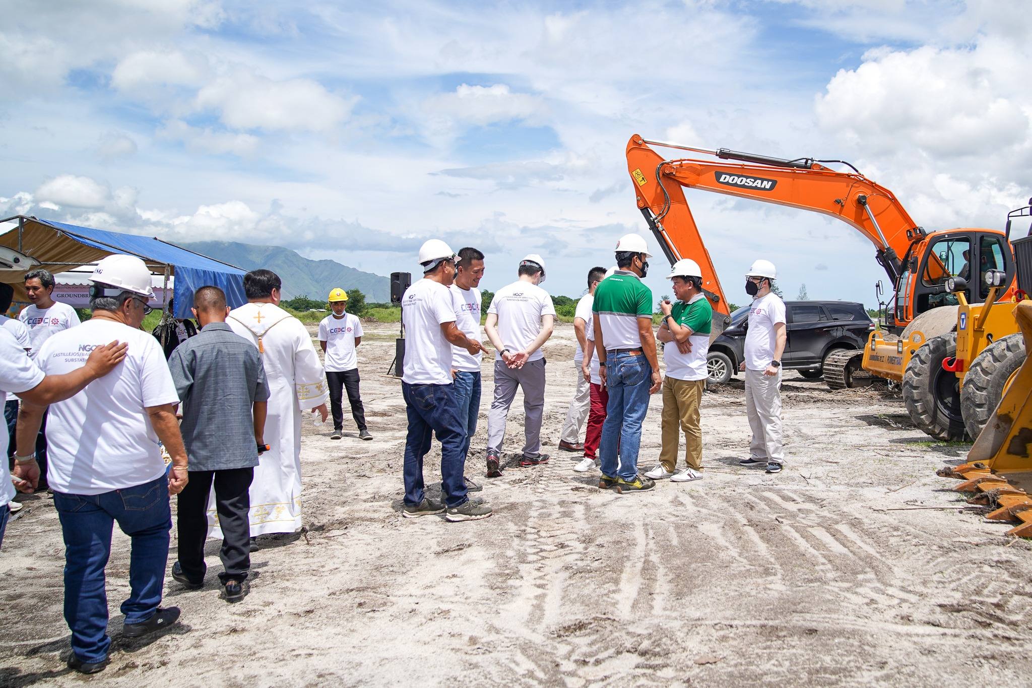 Stakeholders near heavy equipment
